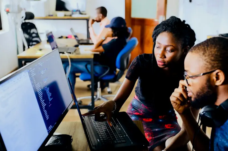Students discussing online courses